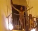 Slut parades naked on balcony