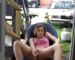 Slut masturbating in the front yard